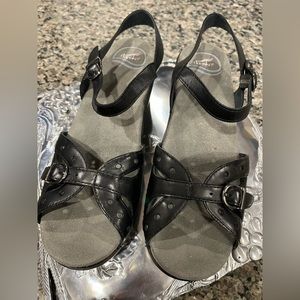 Dansko wedge heeled black leather sandals